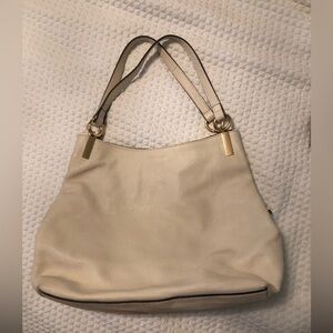 Vince Camuto cream leather shoulder bag.